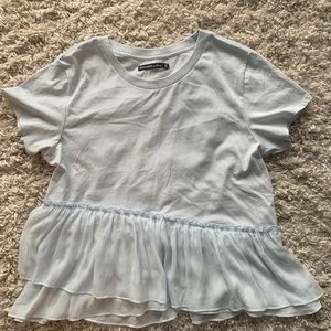 Blue T-shirt with ruffle